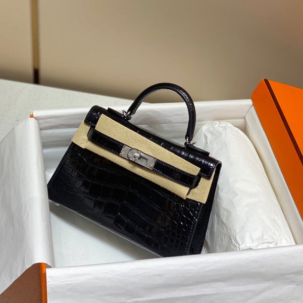 HERMES 25S MINI KELLY 19 AUS SCHWARZEM KALBSLEDER UND SILBERNER HARDWARE