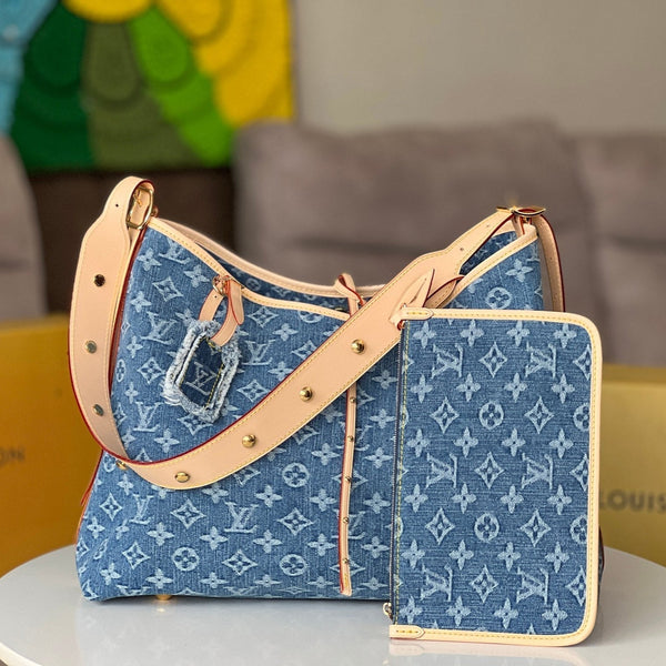 LV 25S CARRYALL 39 AUS BLAUEM DENIM MIT MONOGRAMM-LEDERBESATZ
