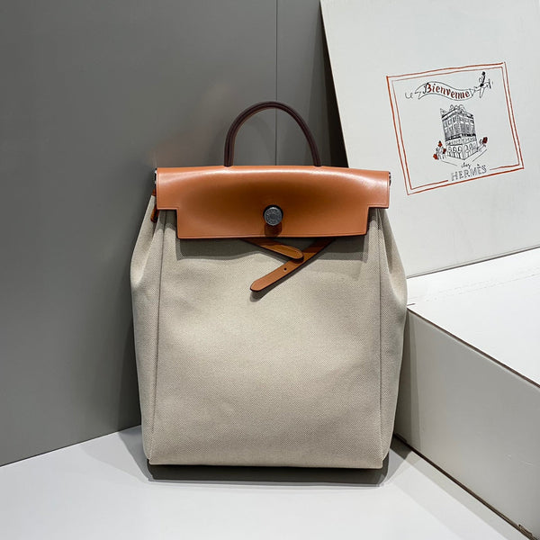 HERBAG A DOS ZIP RETOURNE RUCKSACK 29 AUS OFF-WHITE CANVAS UND BRAUNEM KALBSLEDER