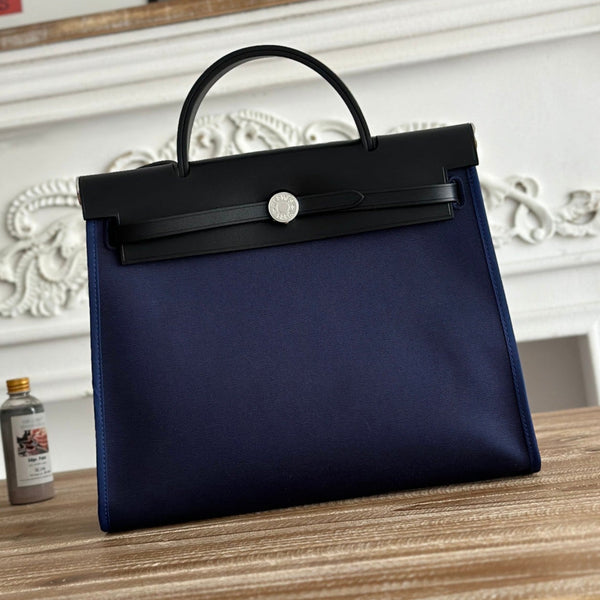 ZIP CABINE 31 TASCHE AUS MARINEBLAUEM CANVAS UND SCHWARZEM KALBSLEDER