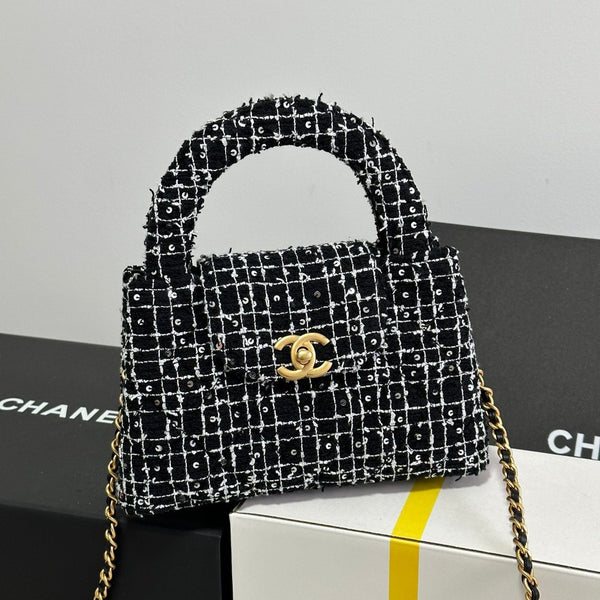 KELLY SHOPPING BAG 19 IN SCHWARZ MIX WEISS TWEED GOLD HARDWARE 